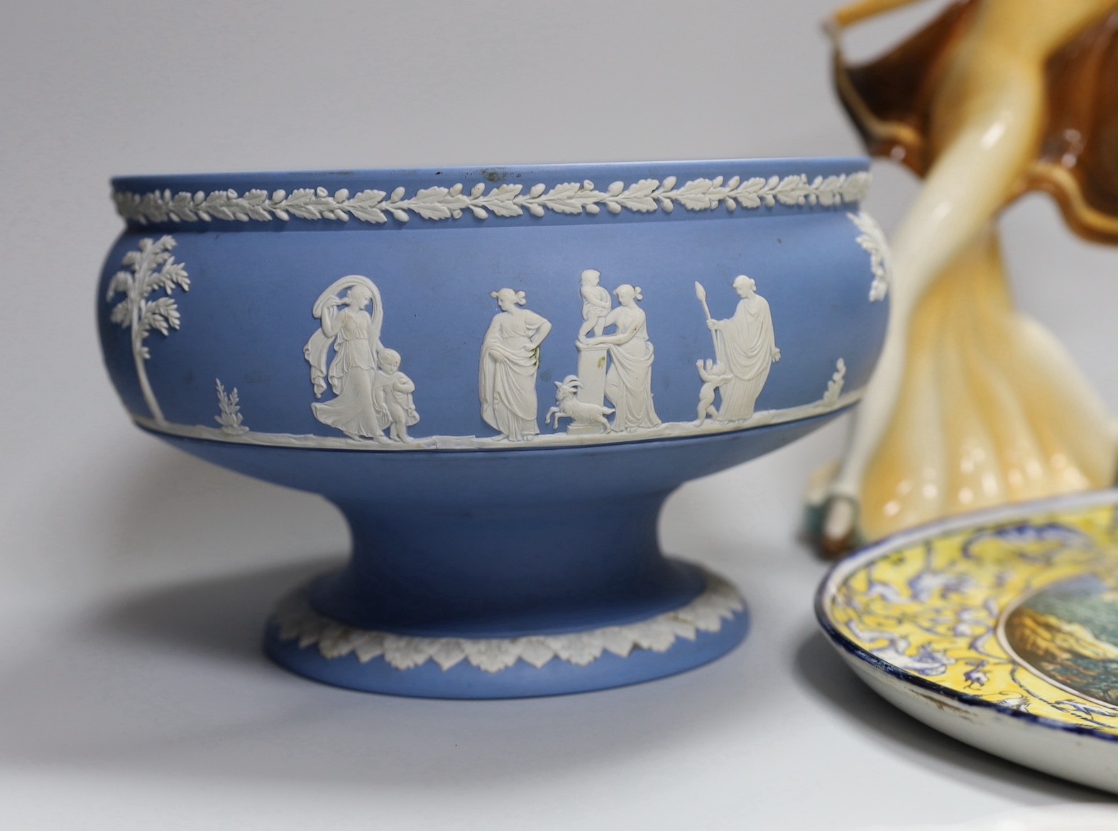 A Gien faience dish, Wedgwood jasper fruit bowl, an Art Deco Katzhutte figure and a pair of basketweave dishes, tallest 23cm